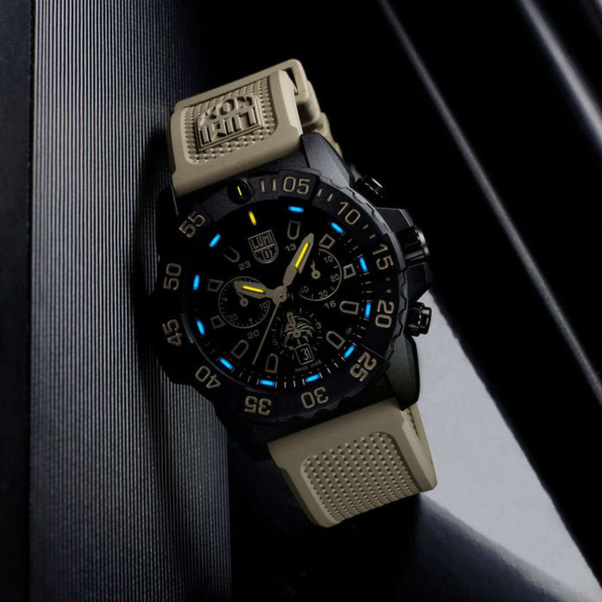 Luminox chronograph watch on black-and-tan rubber strap with luminous markers