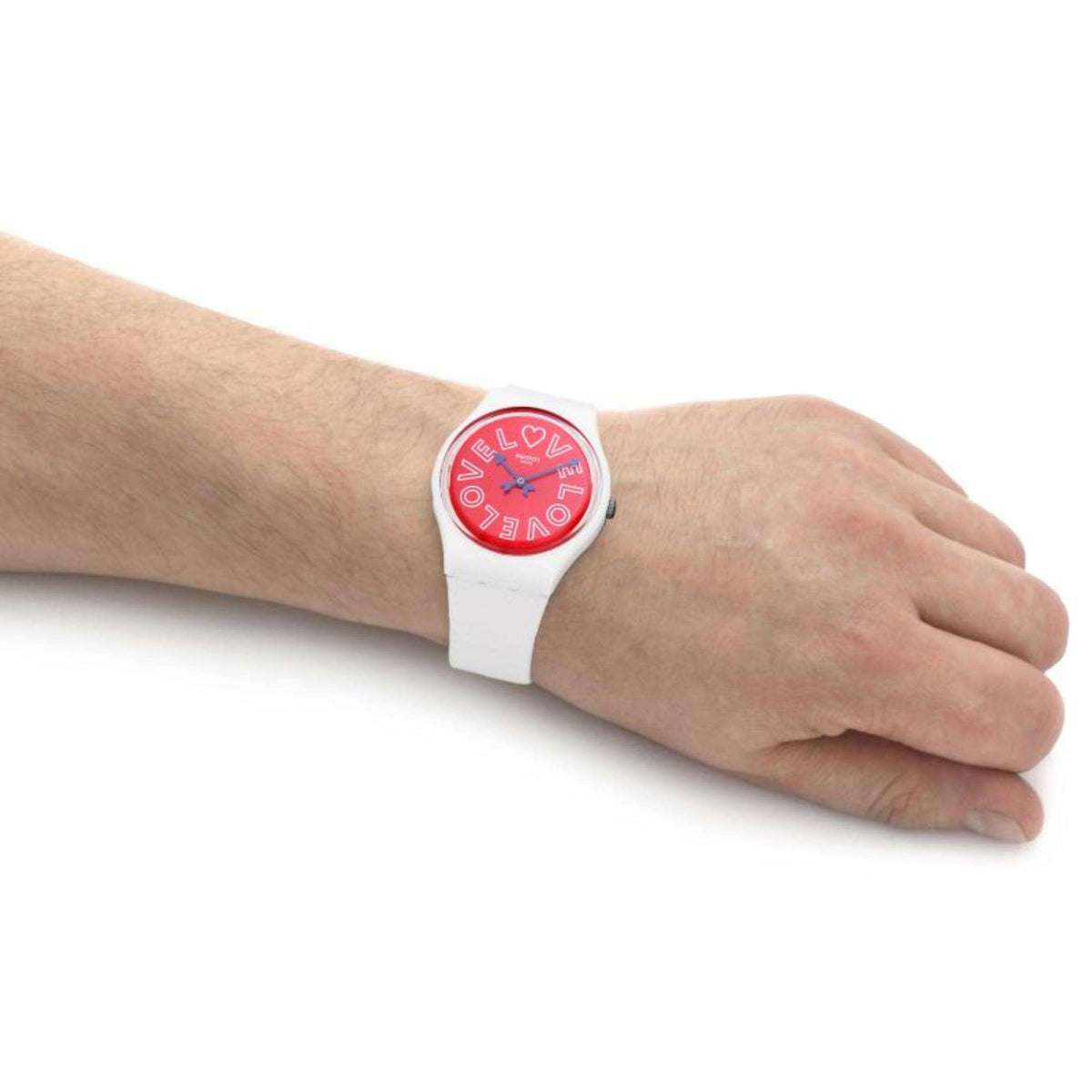 Swatch PUREST LOVE gent watch on wrist with white strap and red round love dial