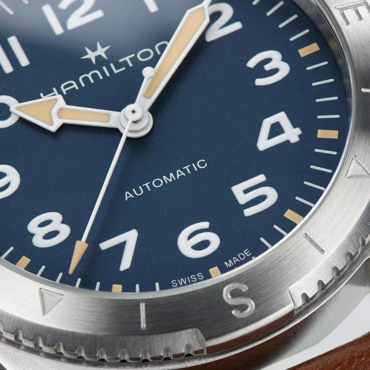 Hamilton Khaki Field H70315540 textured blue dial with Arabic numerals close-up