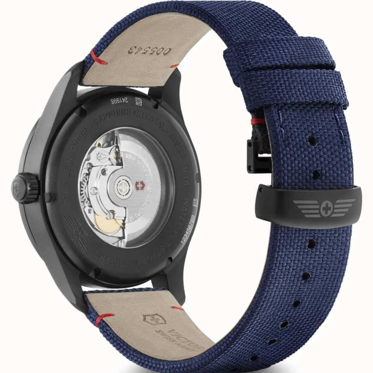 Men's automatic watch with navy fabric strap and visible case back mechanism