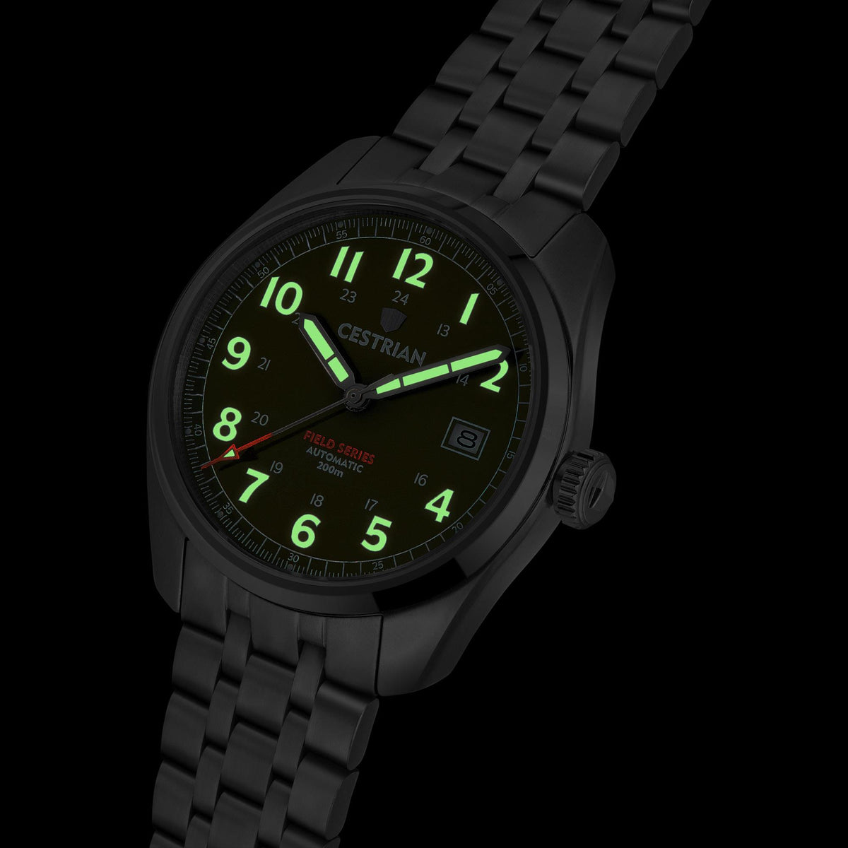 Men's stainless steel automatic watch with blue dial and green glowing hands
