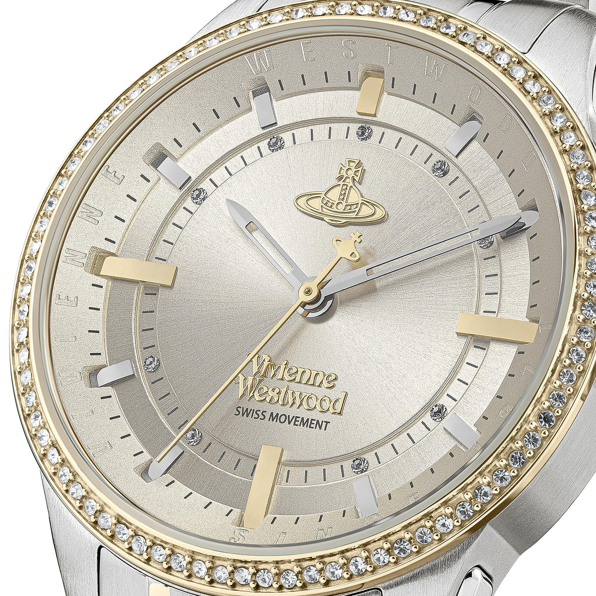 Quartz champagne dial watch with crystal-studded bezel, gold hands and hour markers