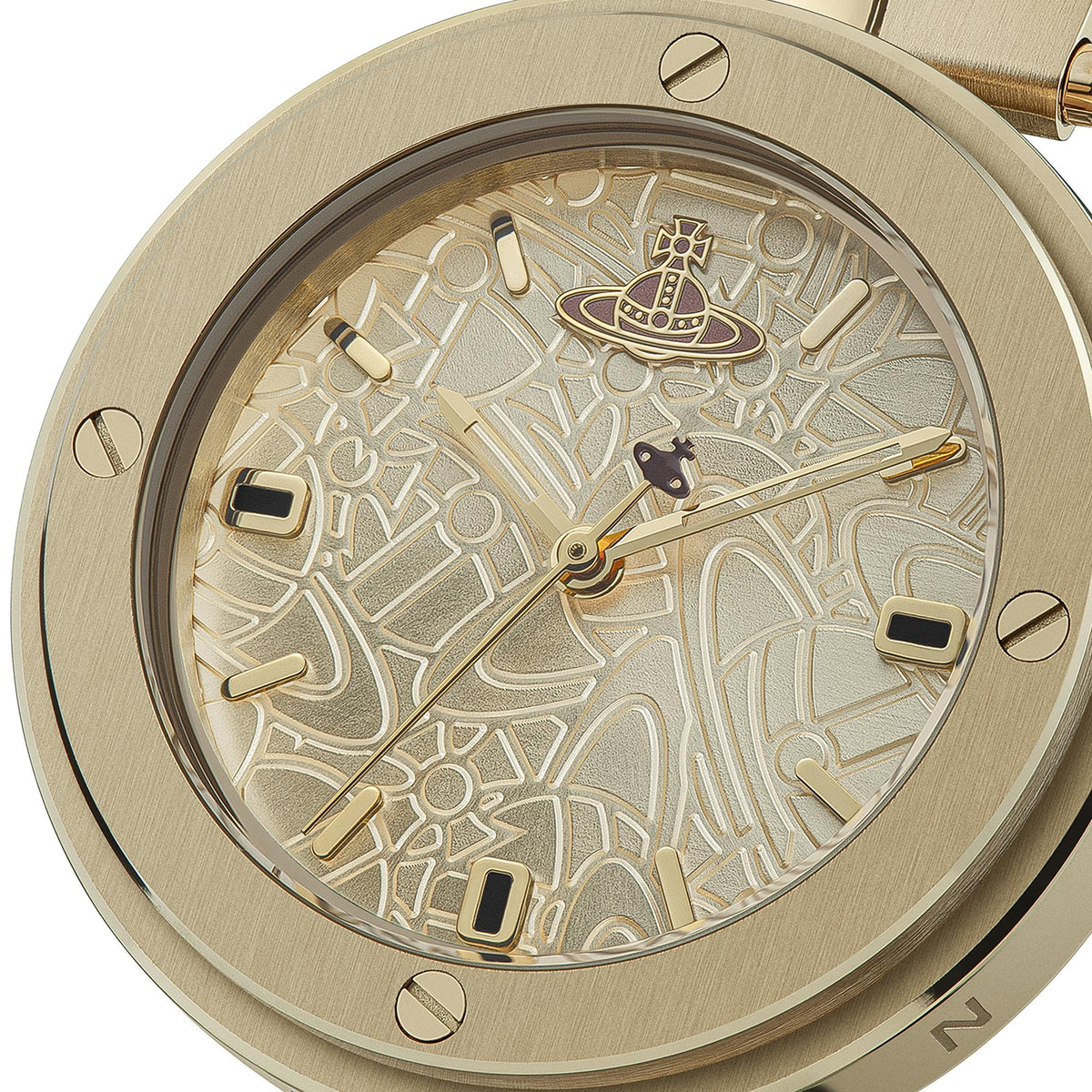 Close-up of gold case and patterned cream dial with geometric graphics and hands