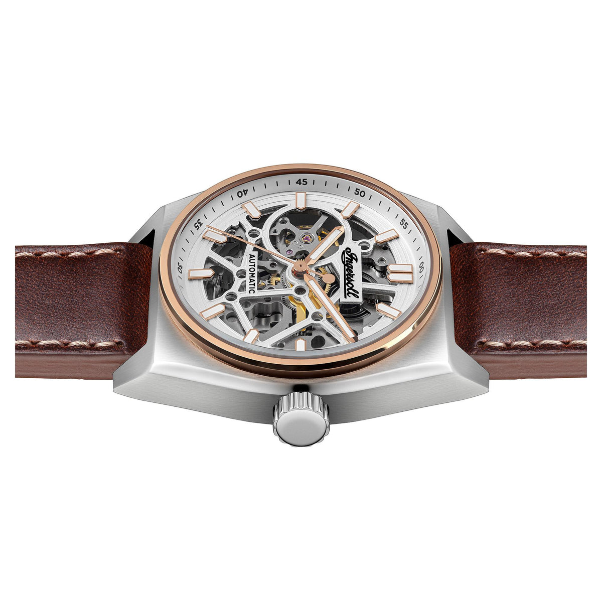Silver-tone automatic skeleton watch on brown leather straps, round case with crown