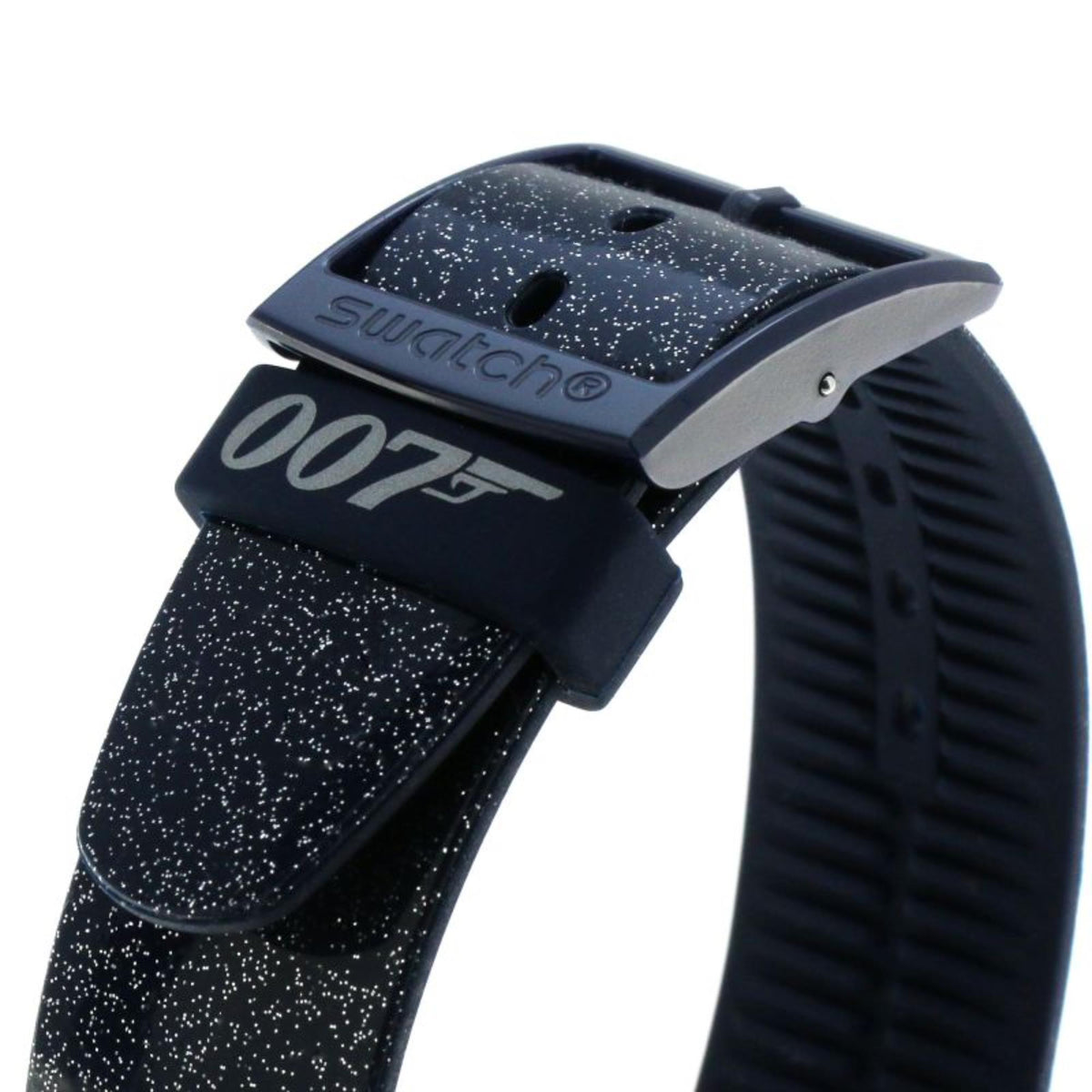 Navy silicone clasp with 'swatch' and '007' text; starry dial edge visible.