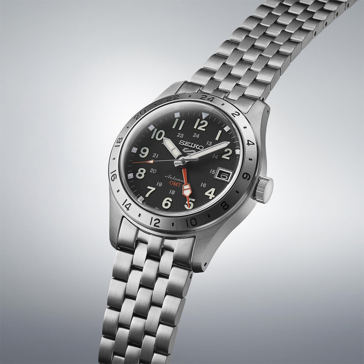 Seiko 5 Sports Field Deploy Mechanical GMT SSK023K1 stainless steel bracelet angled view