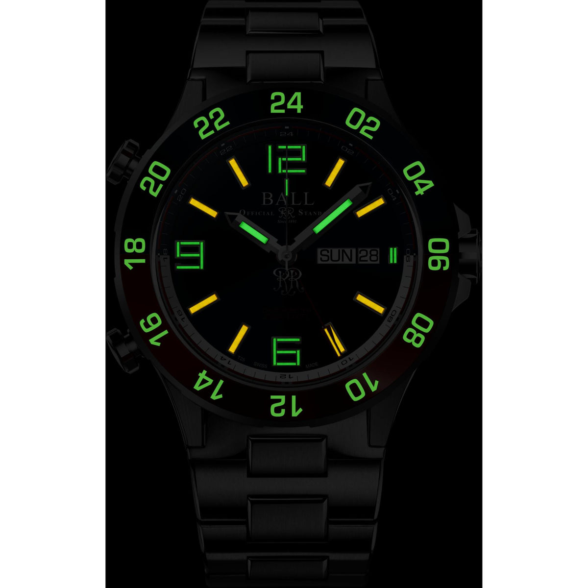 Men's titanium bracelet watch, dark dial with green luminous hour markers and 'SUN 28'.