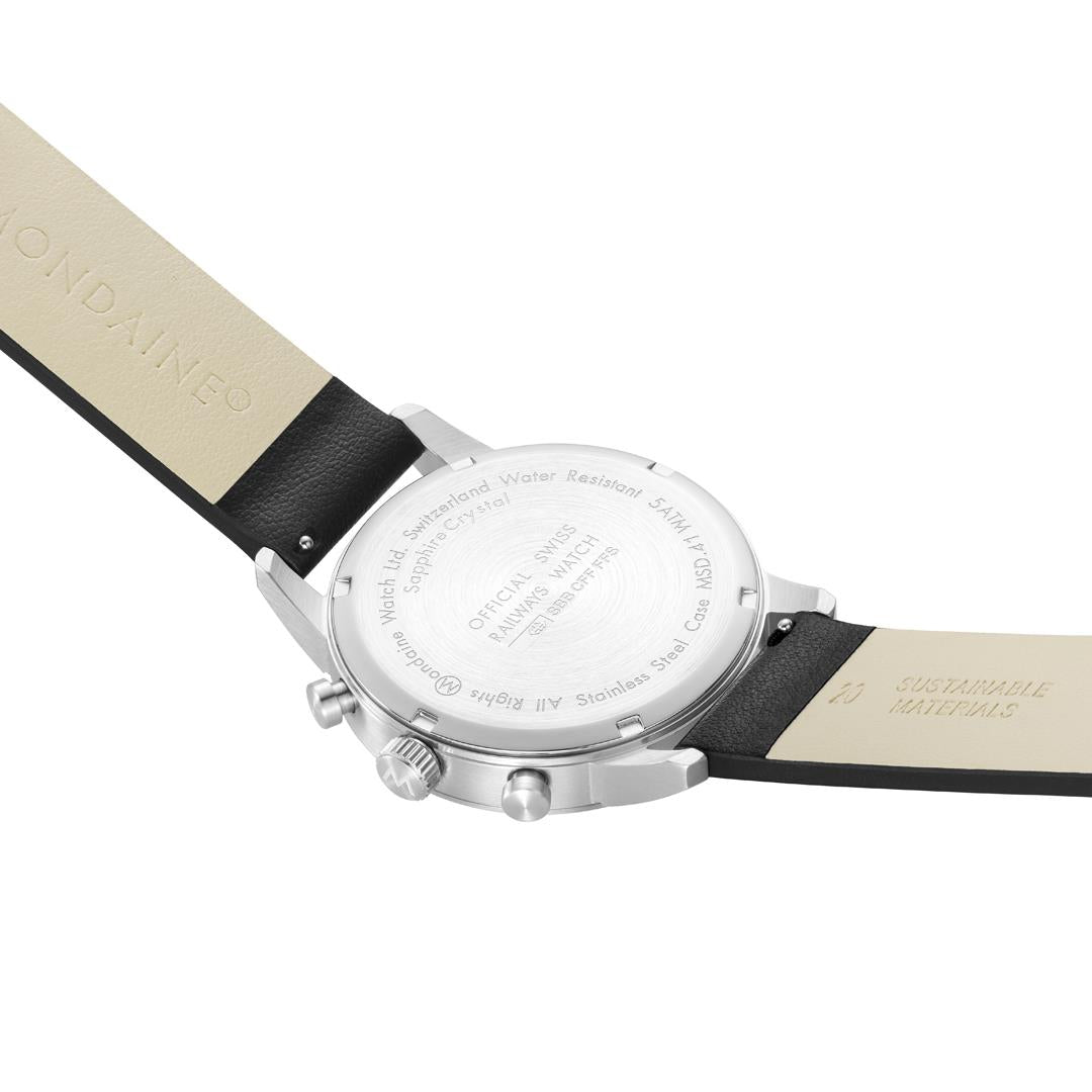Men's chronograph watch angled view: silver case with black leather strap ends