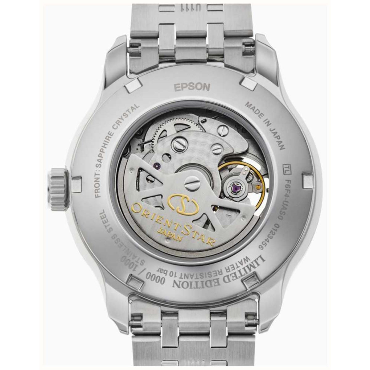 Men's watch caseback showing exposed automatic movement and inscriptions, steel finish