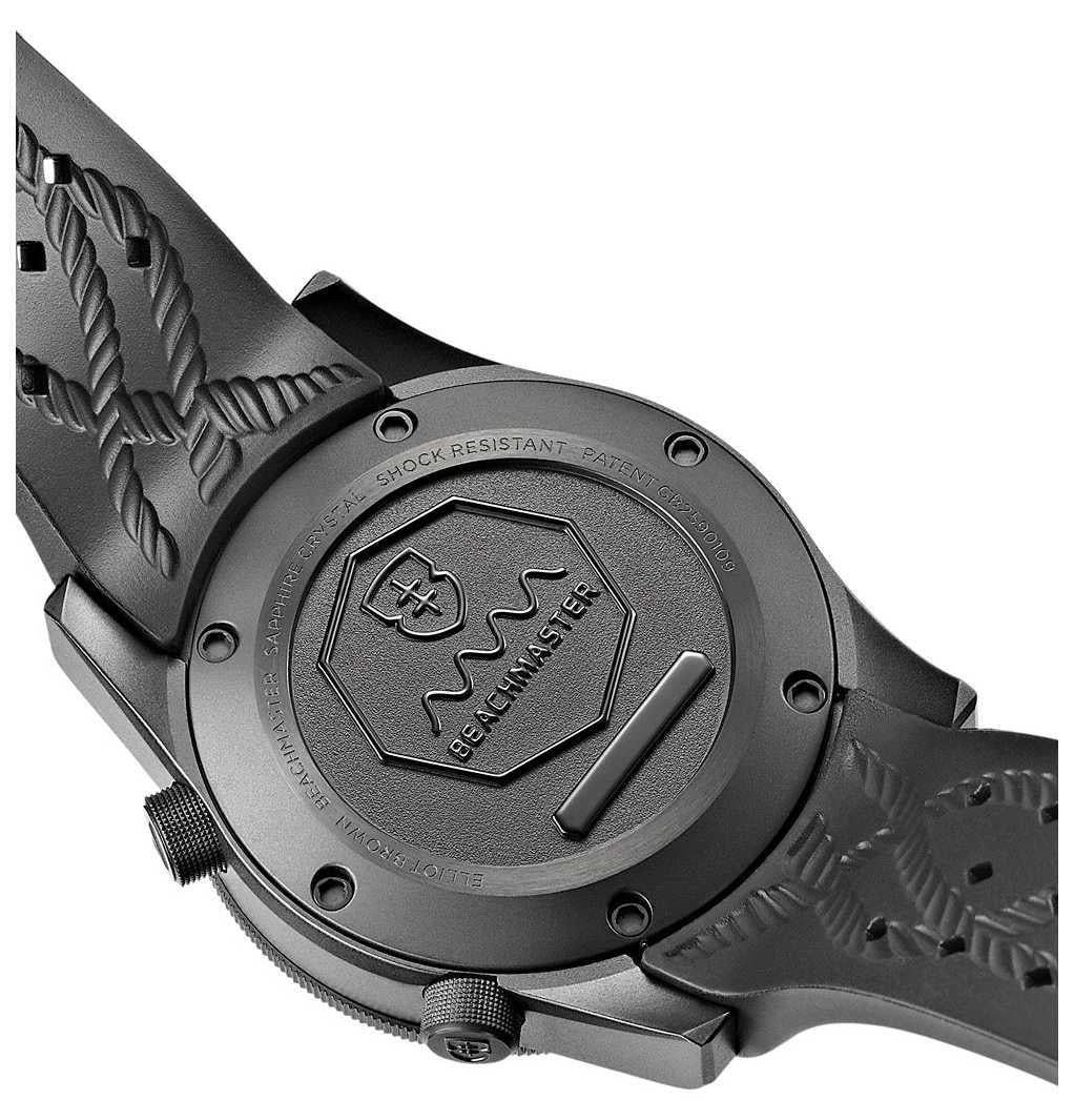 Black rubber-strap men’s wristwatch showing side view of case and crown