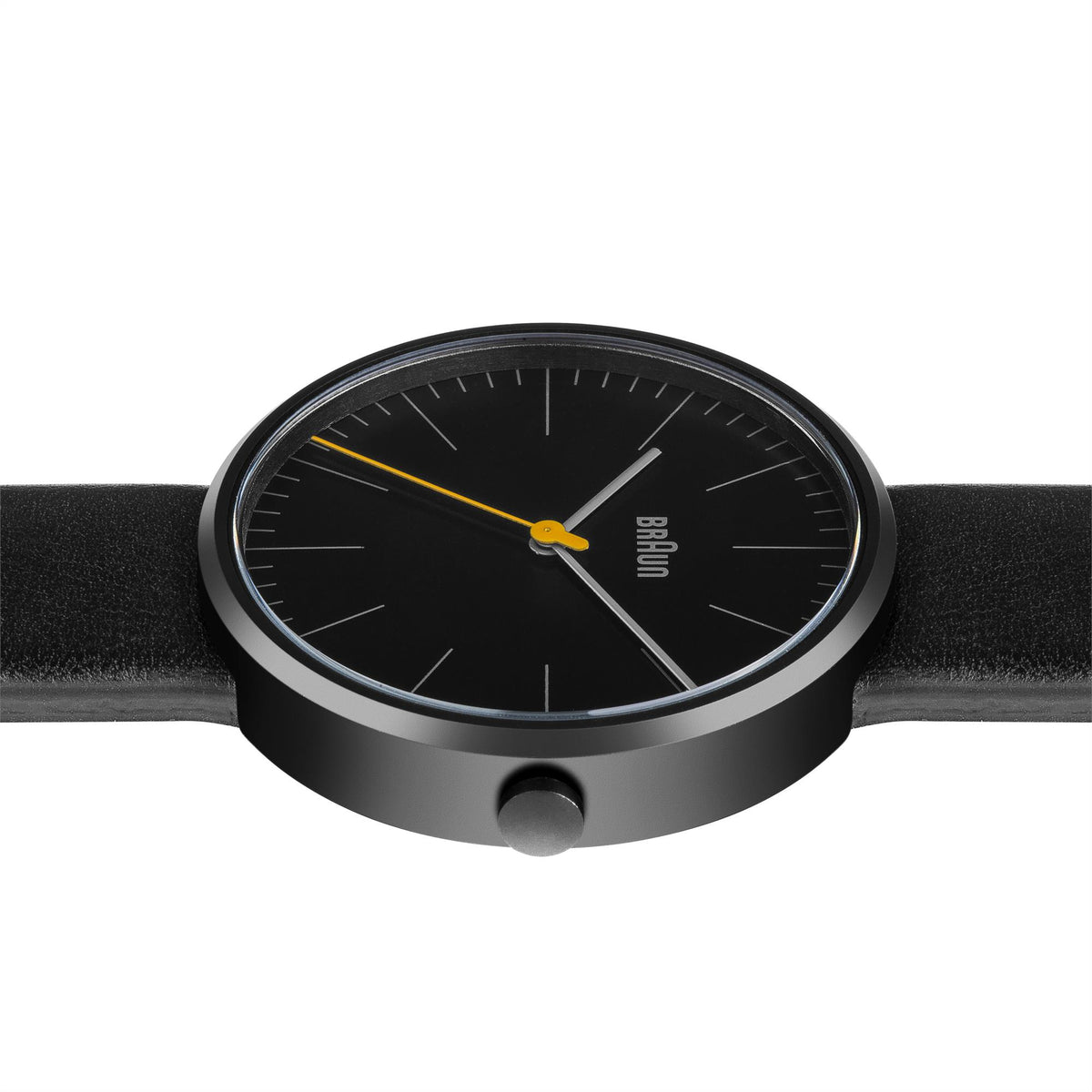 Round watch face with black dial, yellow second hand, and silver-toned bezel