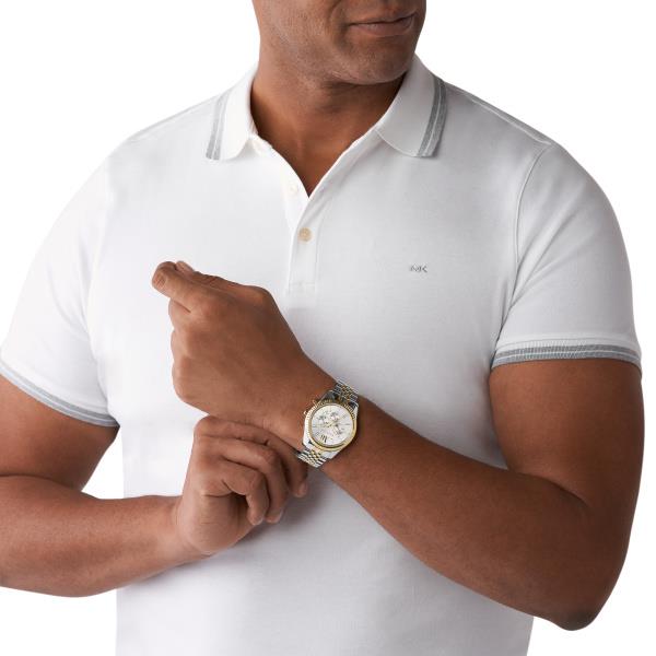 Men's chronograph watch on wrist, silver dial with gold-accented steel bracelet