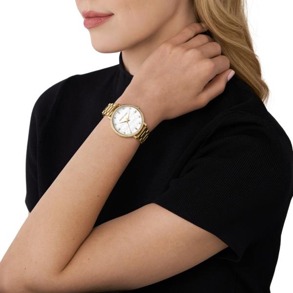 Michael Kors Pyper MK4666 gold-tone stainless steel ladies watch on a womans wrist