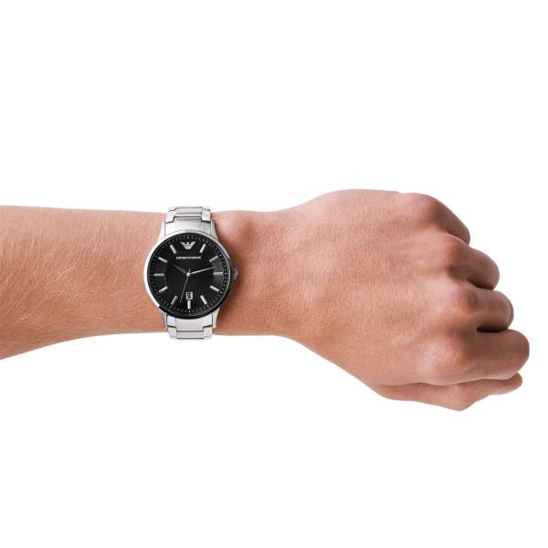 Men's steel quartz watch on wrist, black dial with silver indices and link bracelet
