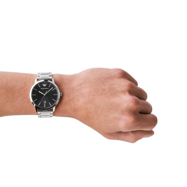 Emporio Armani Ruggero AR11310 mens watch with a black dial and steel bracelet styled on a wrist