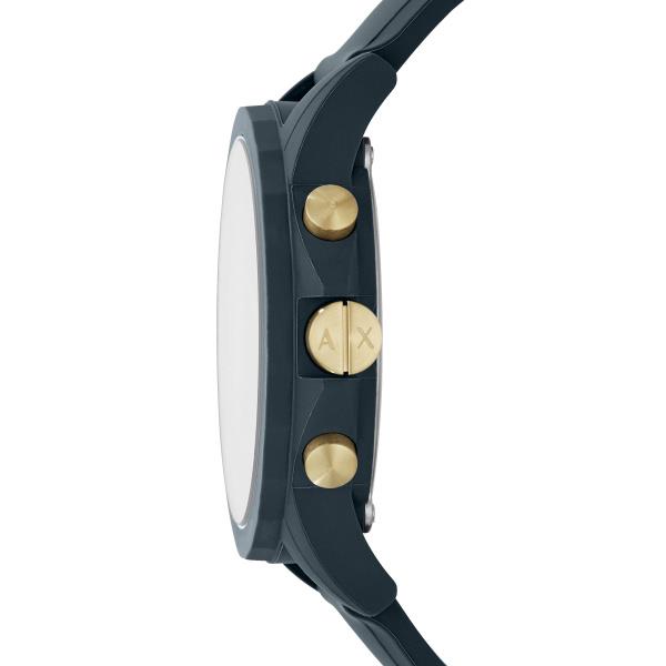 Men's chronograph watch with black silicone strap, gold-tone crowns, and dark case side.