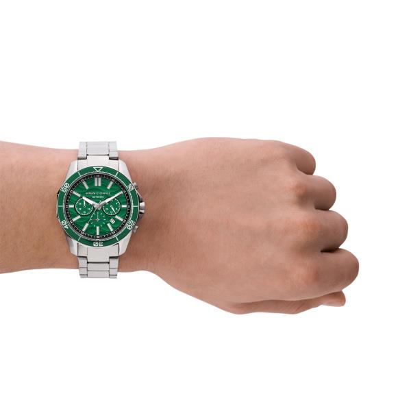 Mens steel wristwatch with green dial and chronograph subdials on a wrist