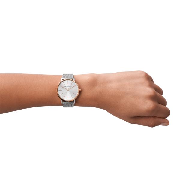 Ladies quartz watch on wrist with silver dial and steel mesh bracelet, Armani Exchange