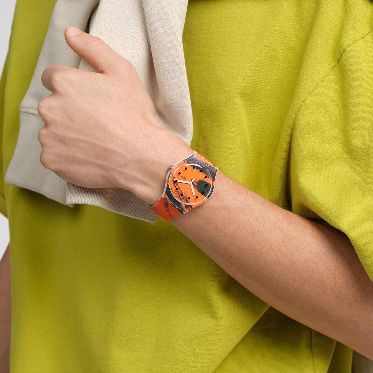 Pink silicone strap wrist watch with orange dial and silver-toned crown