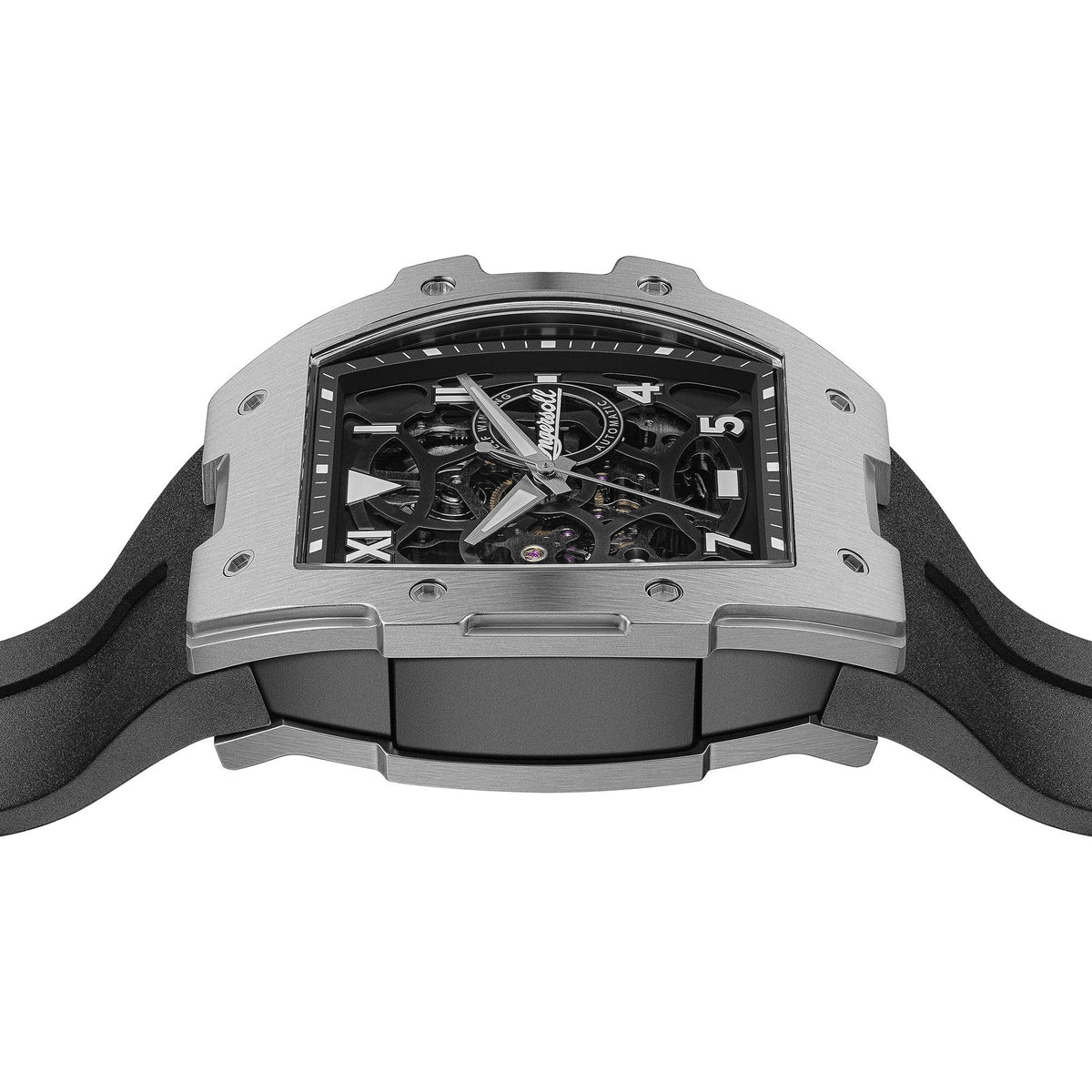Men's skeleton watch head from above, black dial with visible movement and Roman numerals, silver case