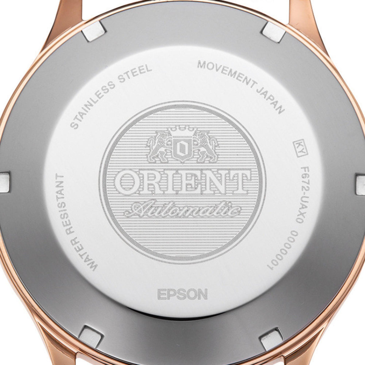 Men's automatic watch caseback close-up, engraved Orient Automatic and Epson