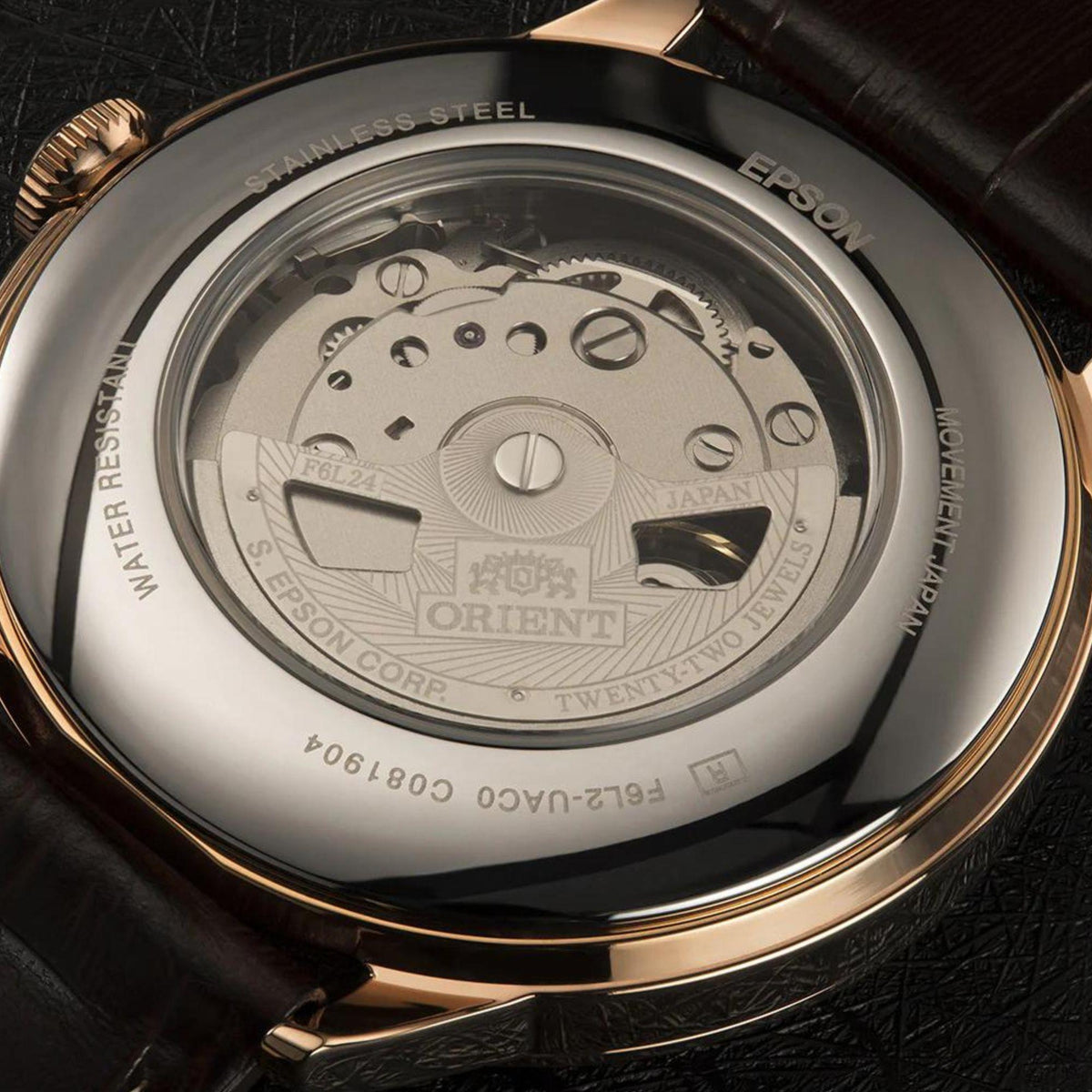 Orient automatic watch caseback, stainless steel back with engraved details