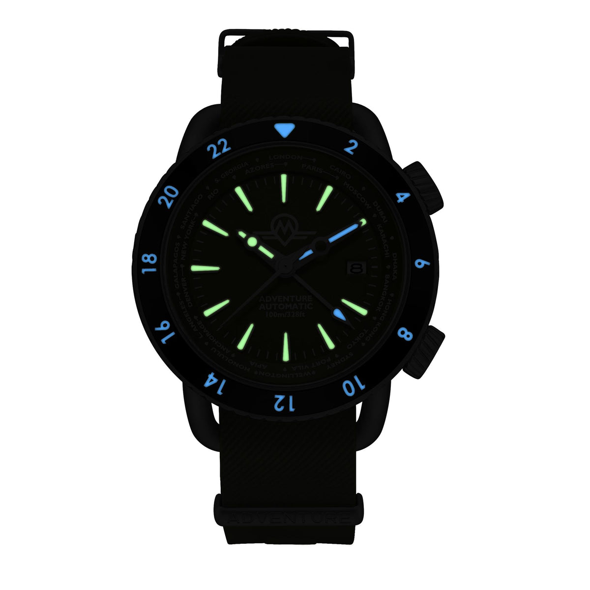 Monro Adventure MA-4 dial and 24-hour bezel blue and green luminous display in the dark close-up
