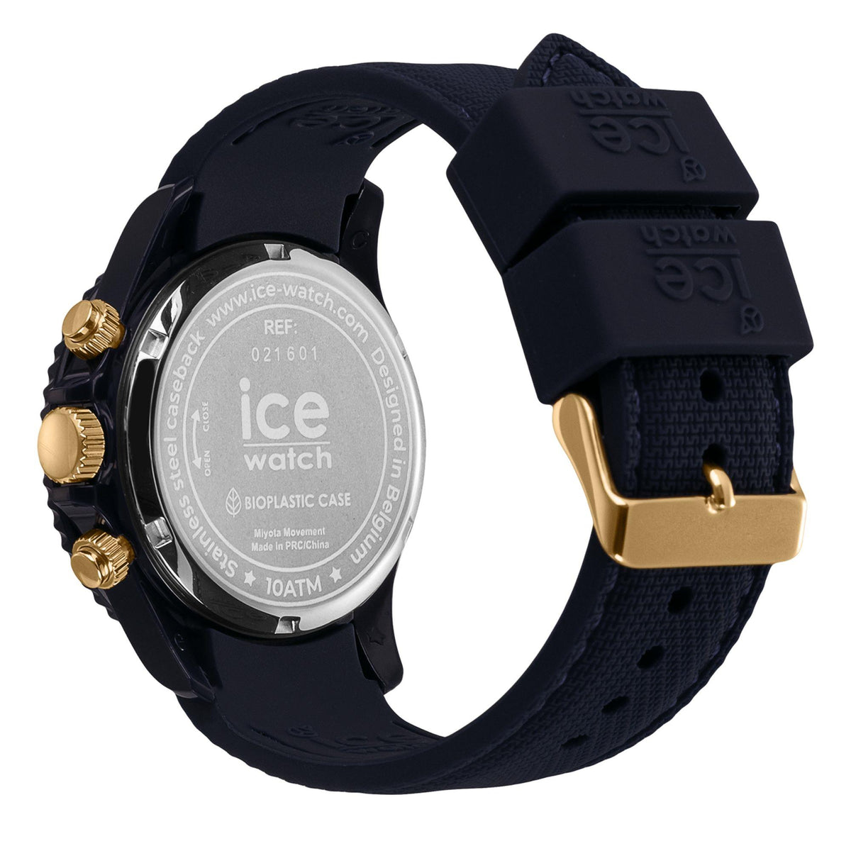 Back of dark blue watch with engraved details, gold-tone hardware, and navy silicone strap