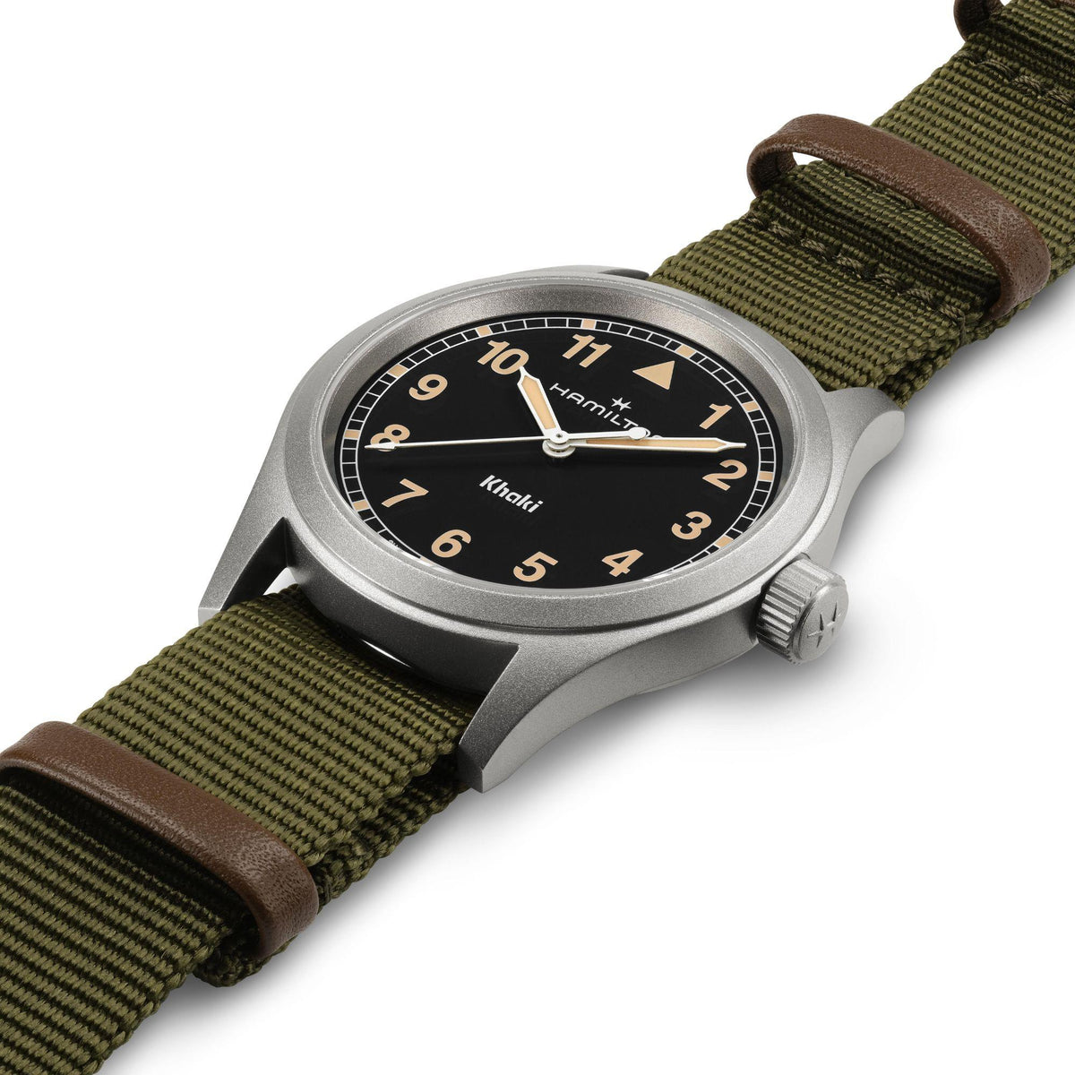 Hamilton Khaki Field H69401930 watch side angle showing sandblasted steel case, crown, and green NATO strap with leather loops