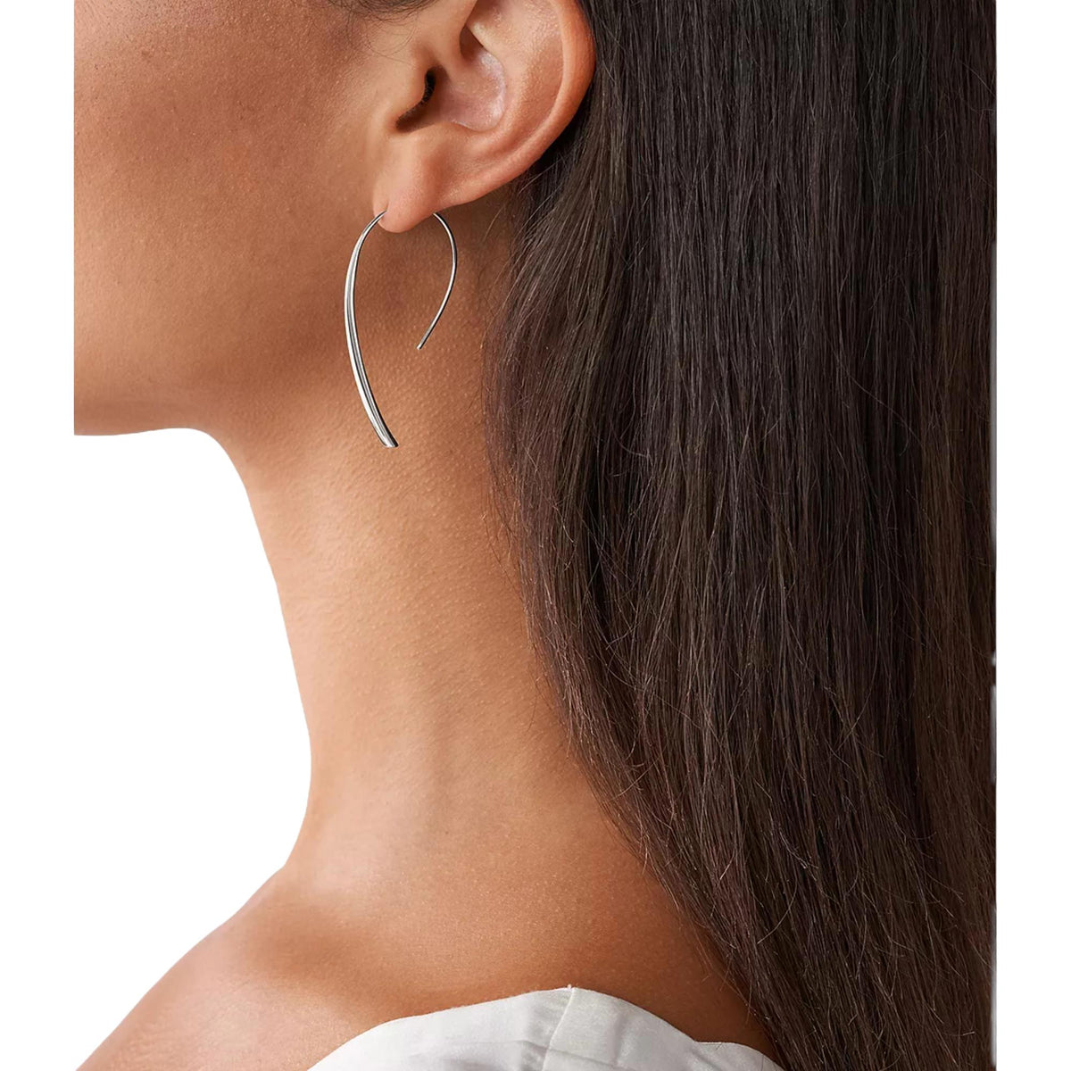 Stainless steel hoop earrings on a model, curved teardrop shape with slim wire
