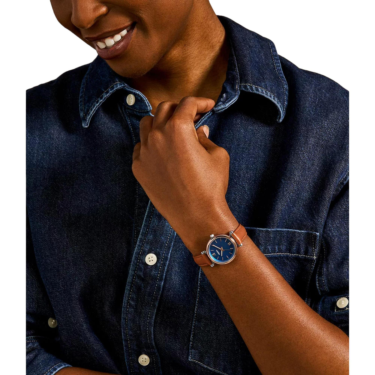 Fossil Carlie Mini ES4701 model wearing a 28mm ladies quartz watch on wrist