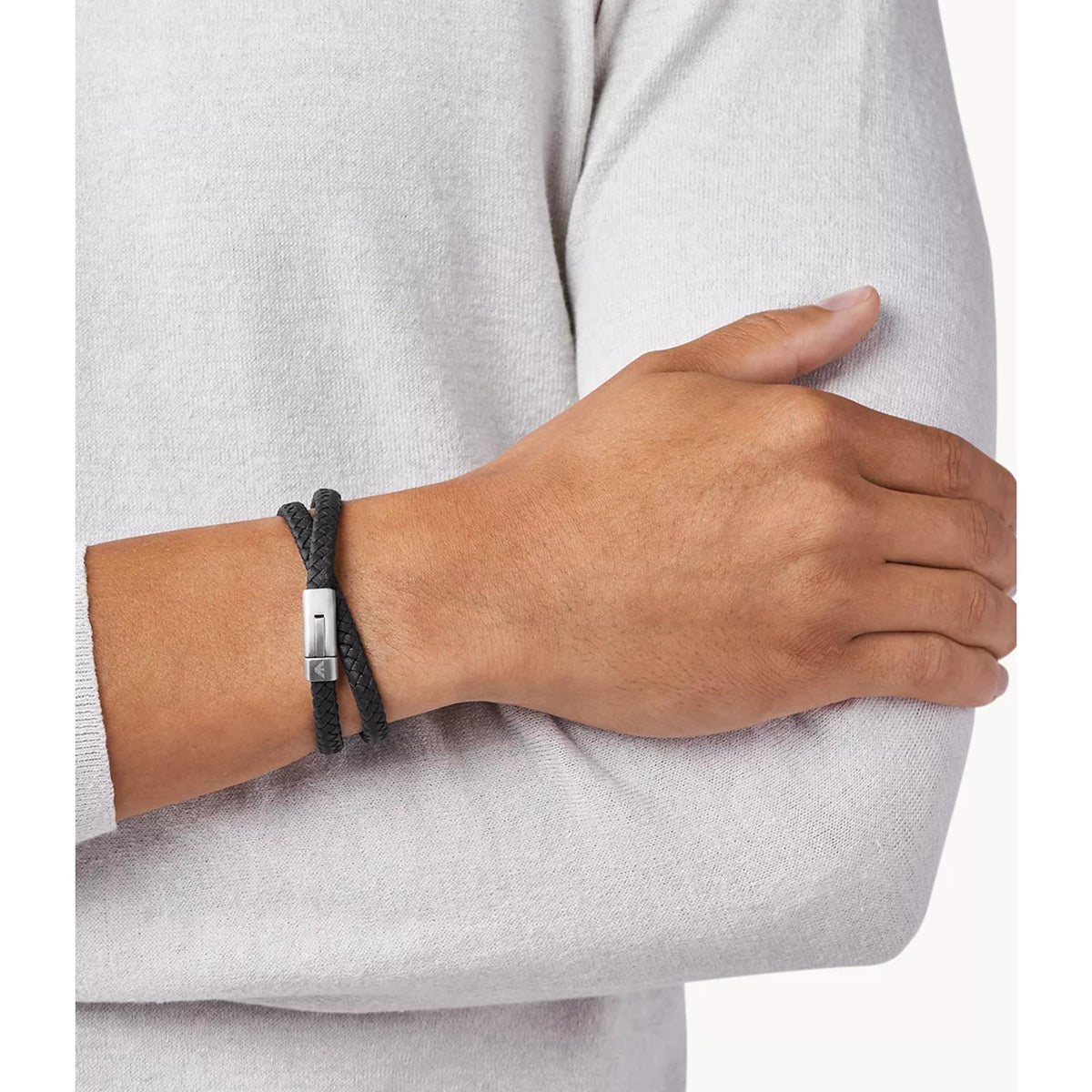Black braided leather men's bracelet worn on wrist with steel clasp