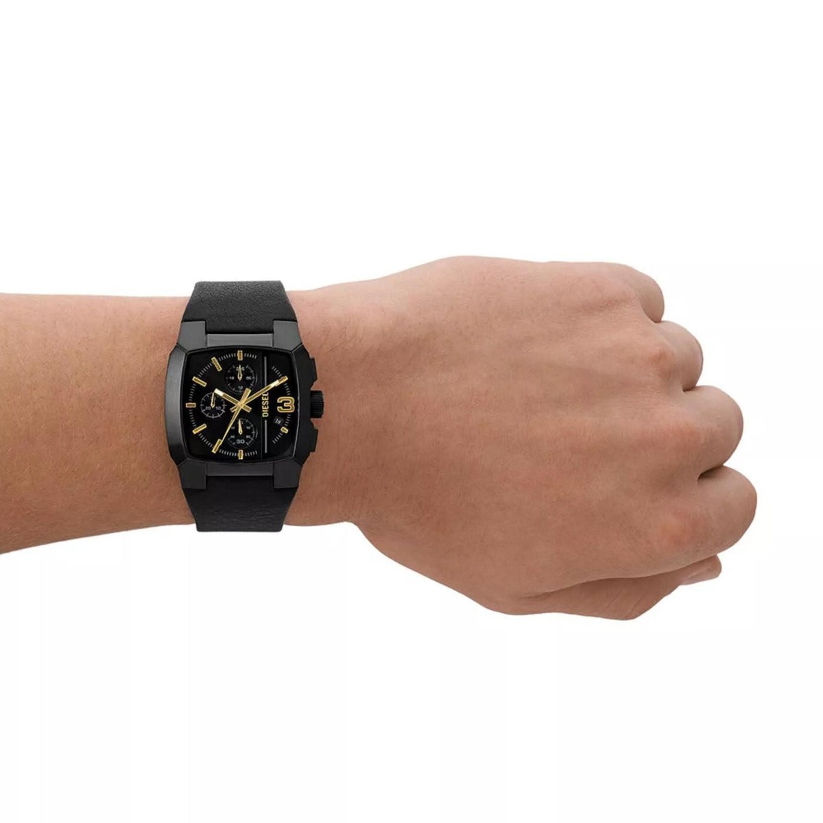 Mens black leather chronograph watch on wrist, black dial with gold-tone details
