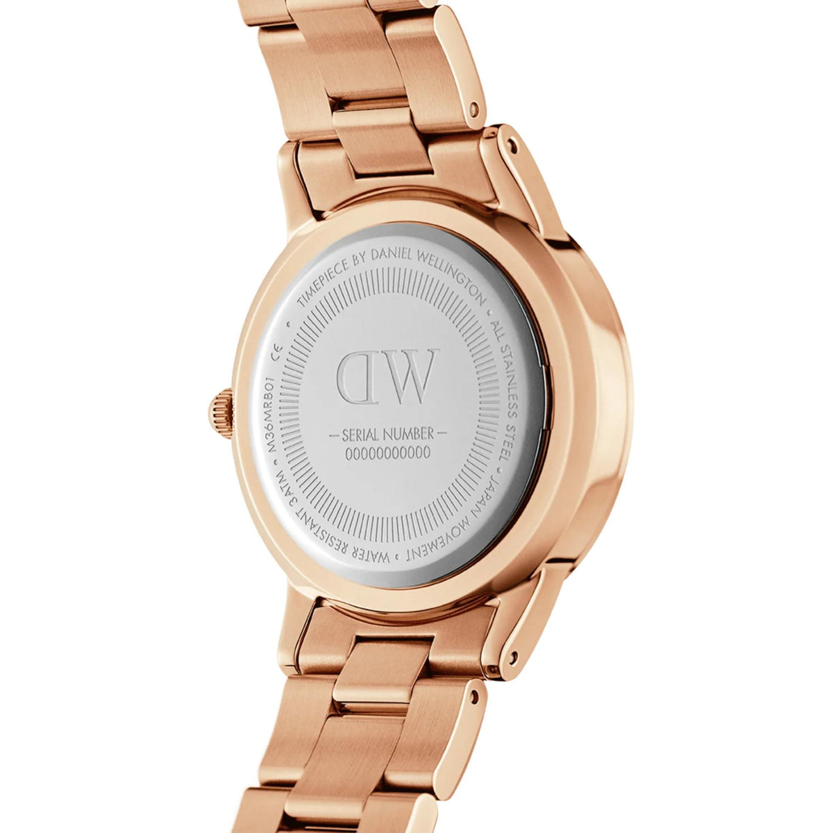 Daniel Wellington quartz watch case back with engraved details, rose-gold steel bracelet