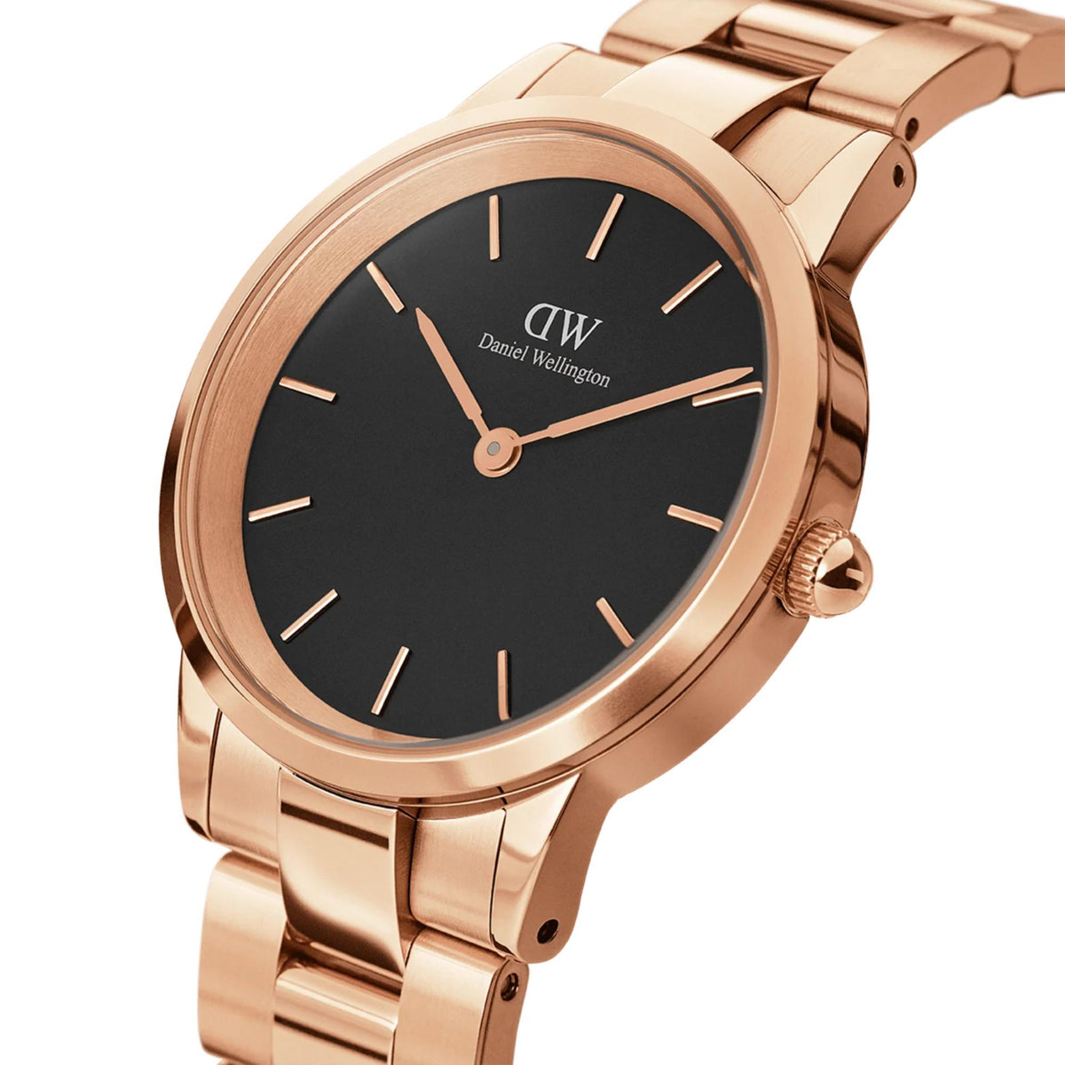 Rose gold tone steel wristwatch close-up: black dial, rose-gold hands and indices