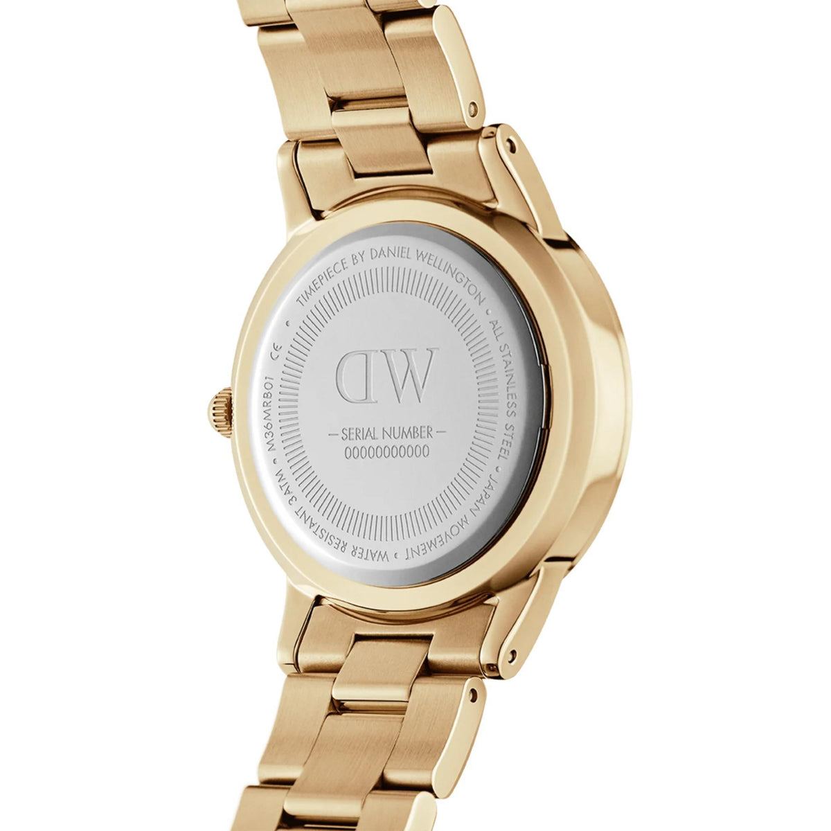 Back of gold-tone steel wristwatch with engraved case details