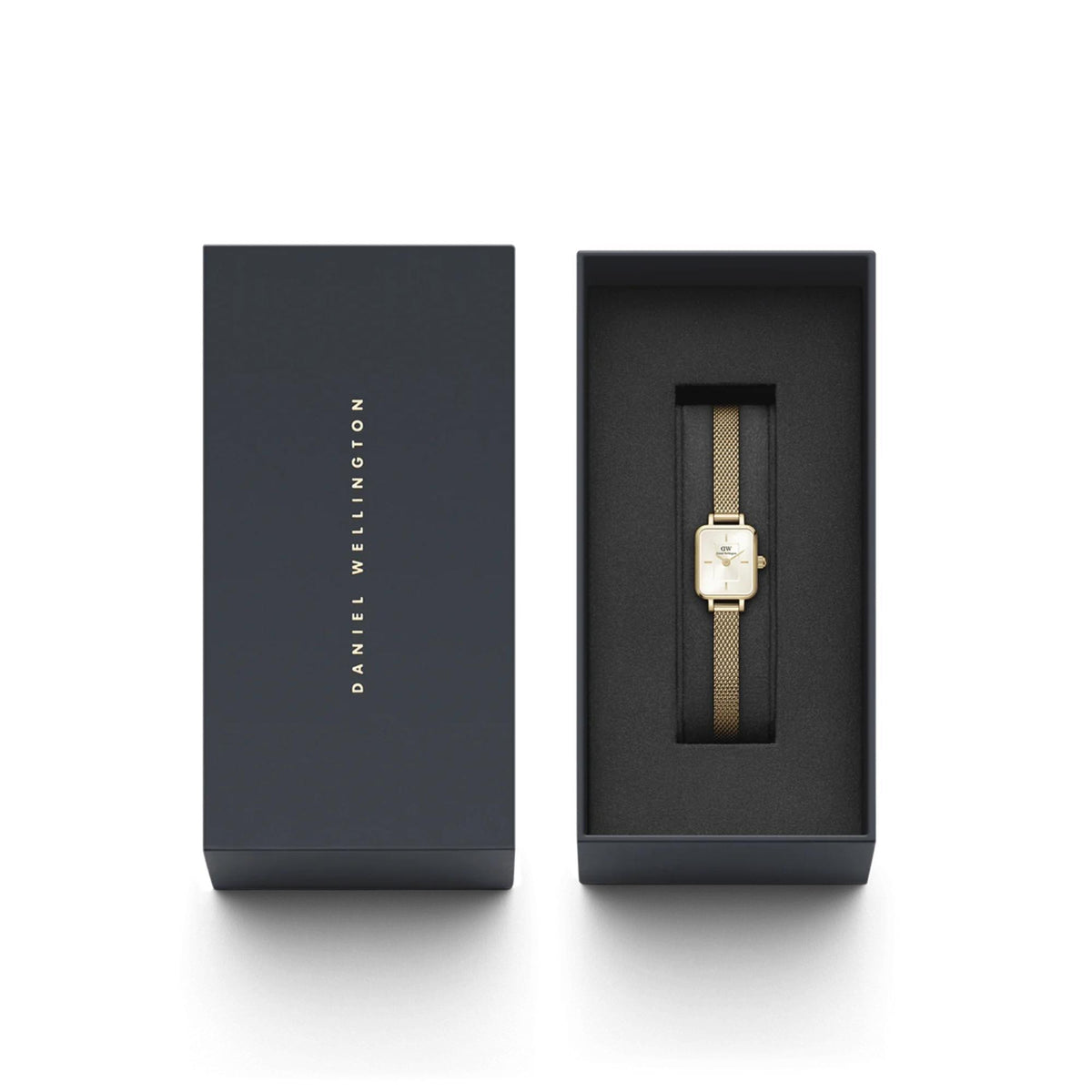 Daniel Wellington watch box with square gold-toned watch displayed inside