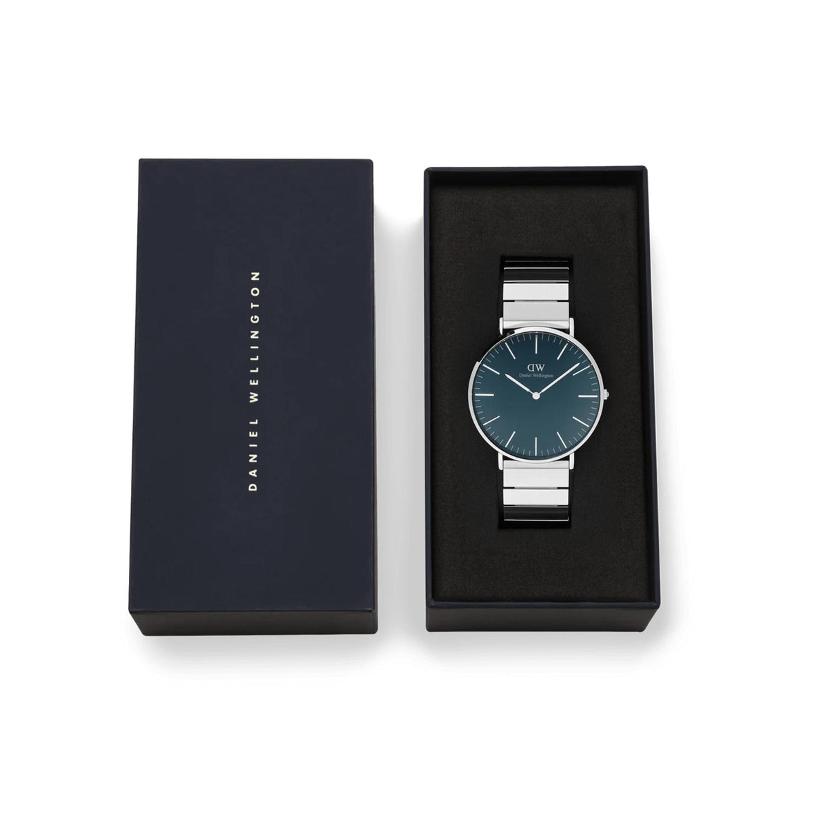 Daniel Wellington watch in open box with blue dial and stainless steel bracelet
