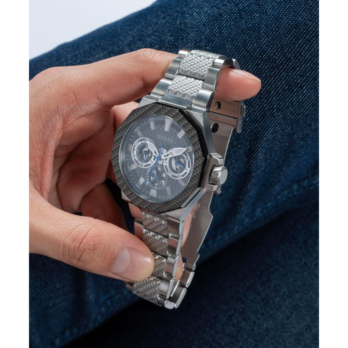 Men's wrist watch with grey dial, blue-accent subdials, silver-tone textured steel bracelet
