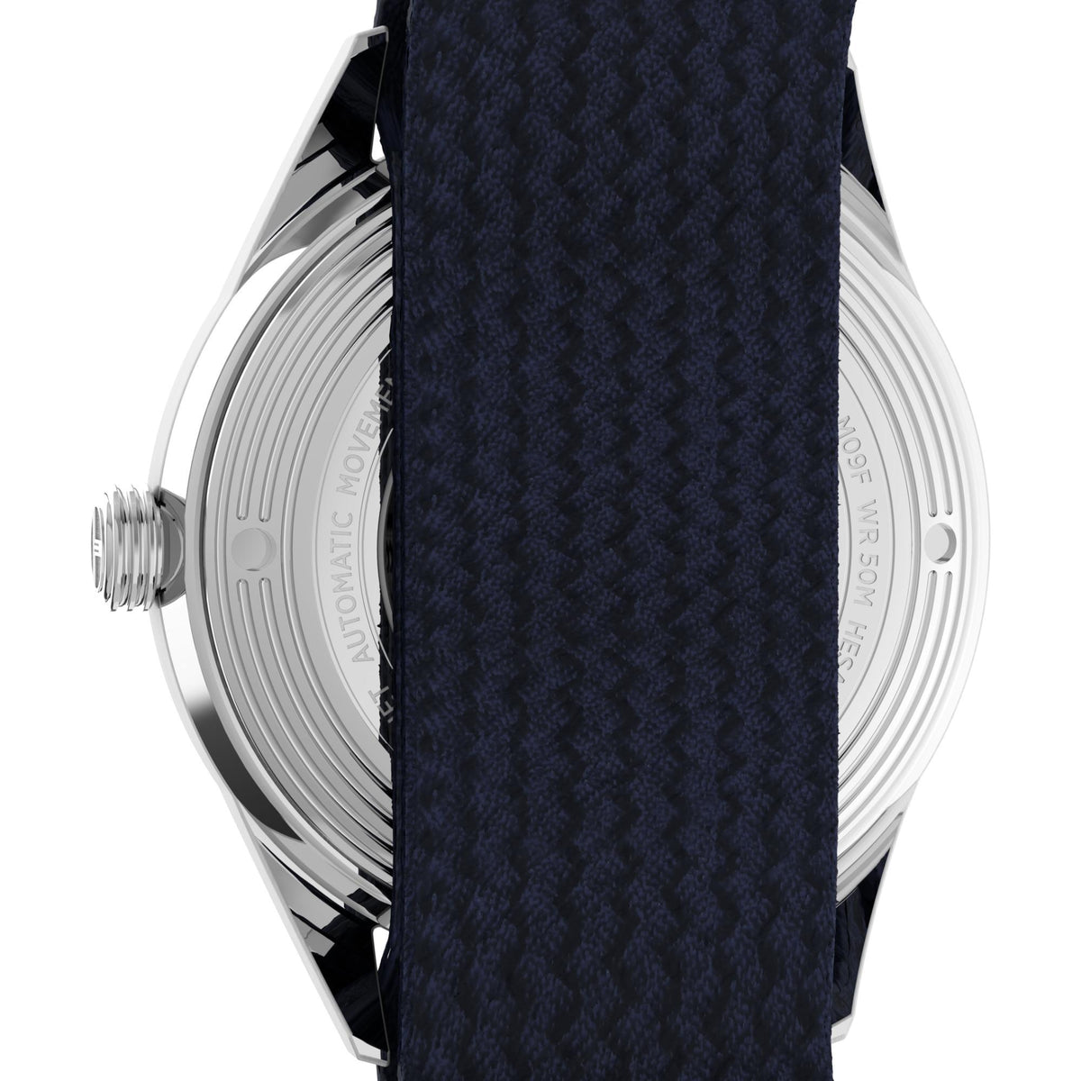 Silver watch case side with dark navy woven fabric strap