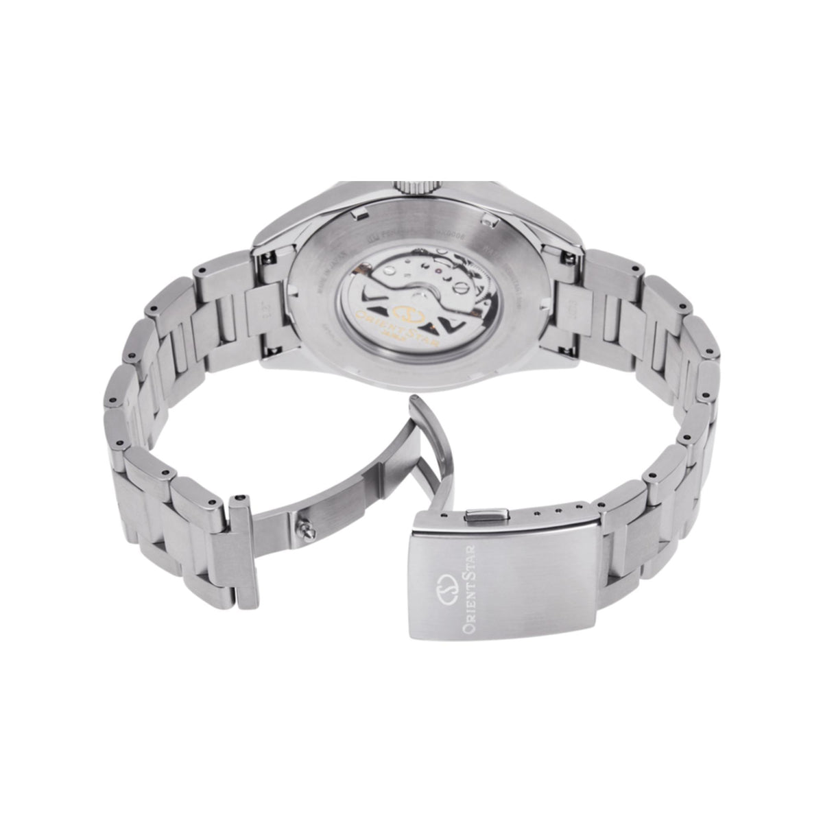 Steel automatic watch case back with visible movement and linked silver bracelet