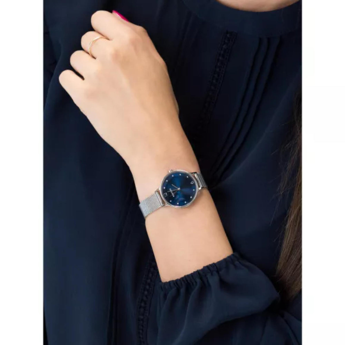 Skagen Anita Lille SKW2307 quartz timepiece with a deep ocean dial paired with a navy top on a wrist