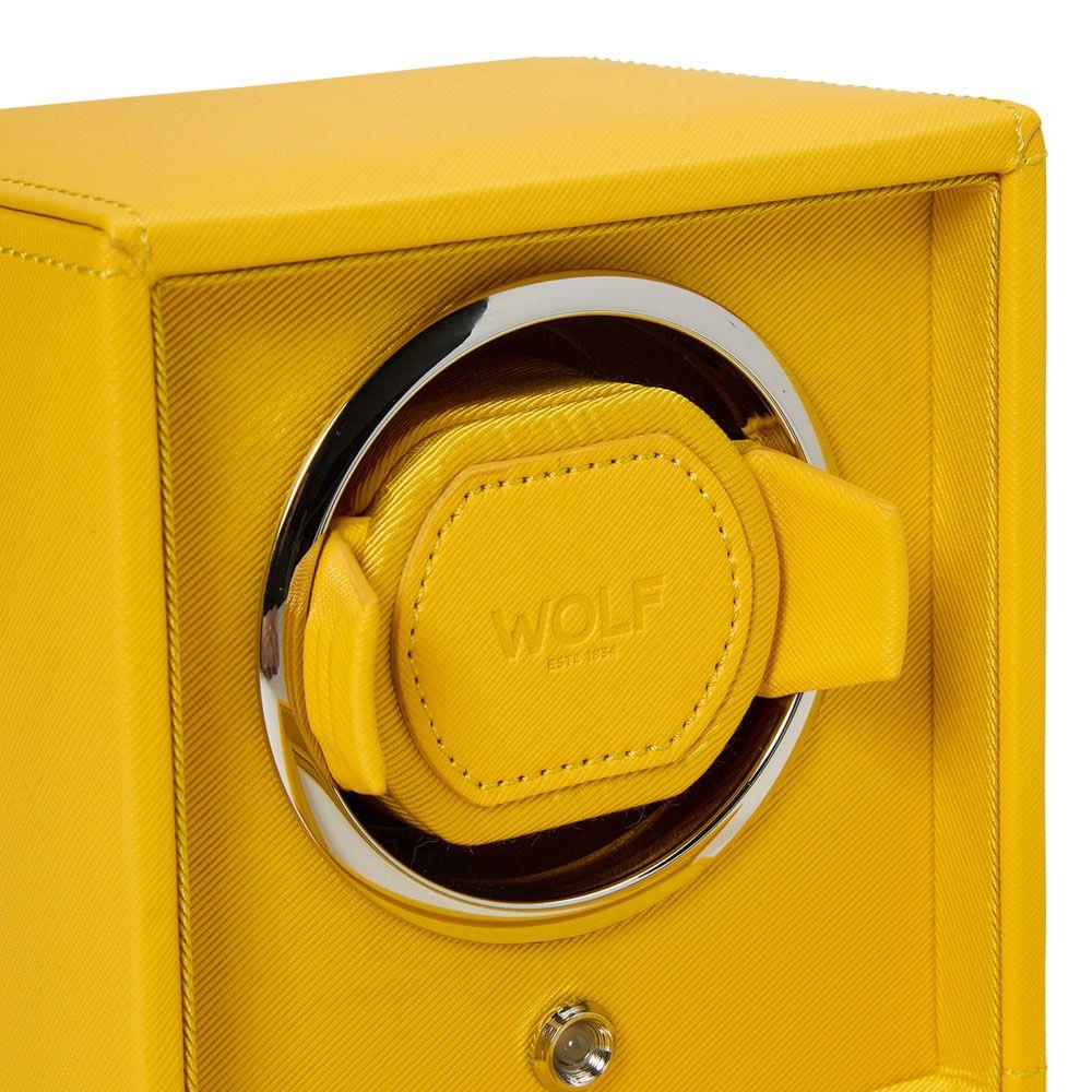 Vibrant yellow watch winder cushion with WOLF embossed logo and chrome ring