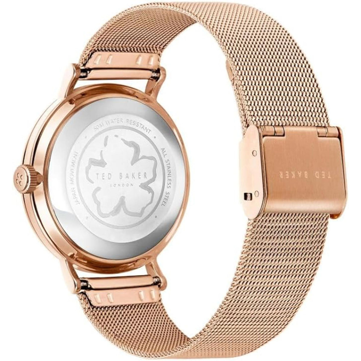 Ladies rose gold mesh band watch showing engraved caseback and side crown