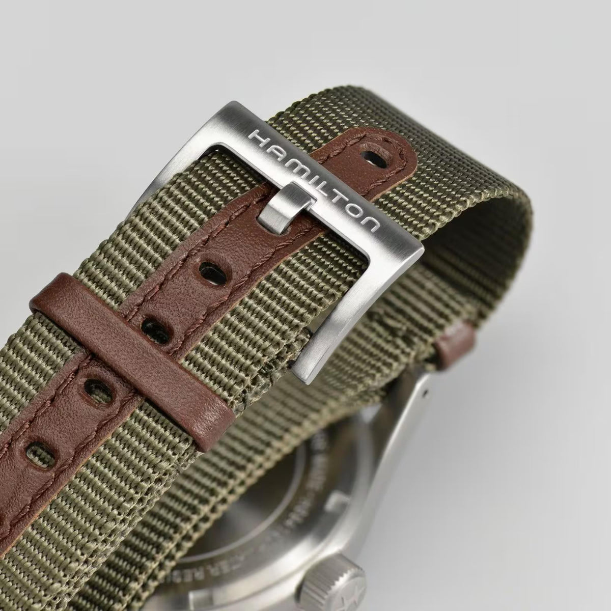 Hamilton NATO textile watch strap with silver buckle and brown leather keeper