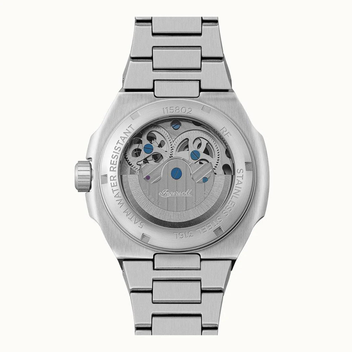 Men’s automatic skeleton watch back with engraved text on silver case and metal bracelet