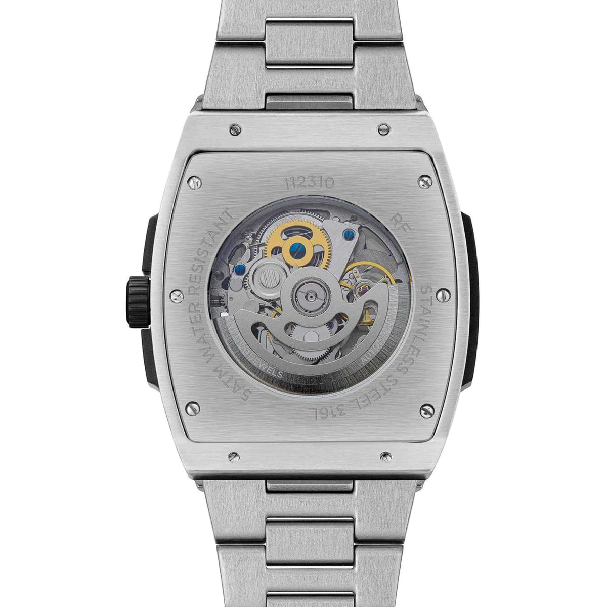 Silver watch case and back with engraved dial details showing mechanical movement