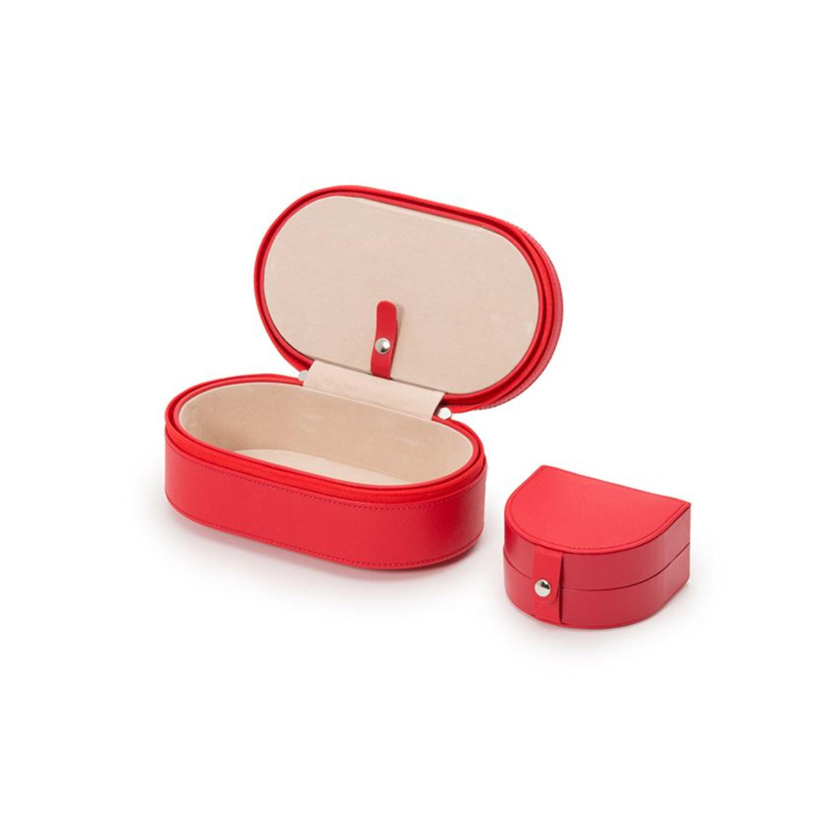 Red leather oval zip case open with beige lining; matching small red accessory box