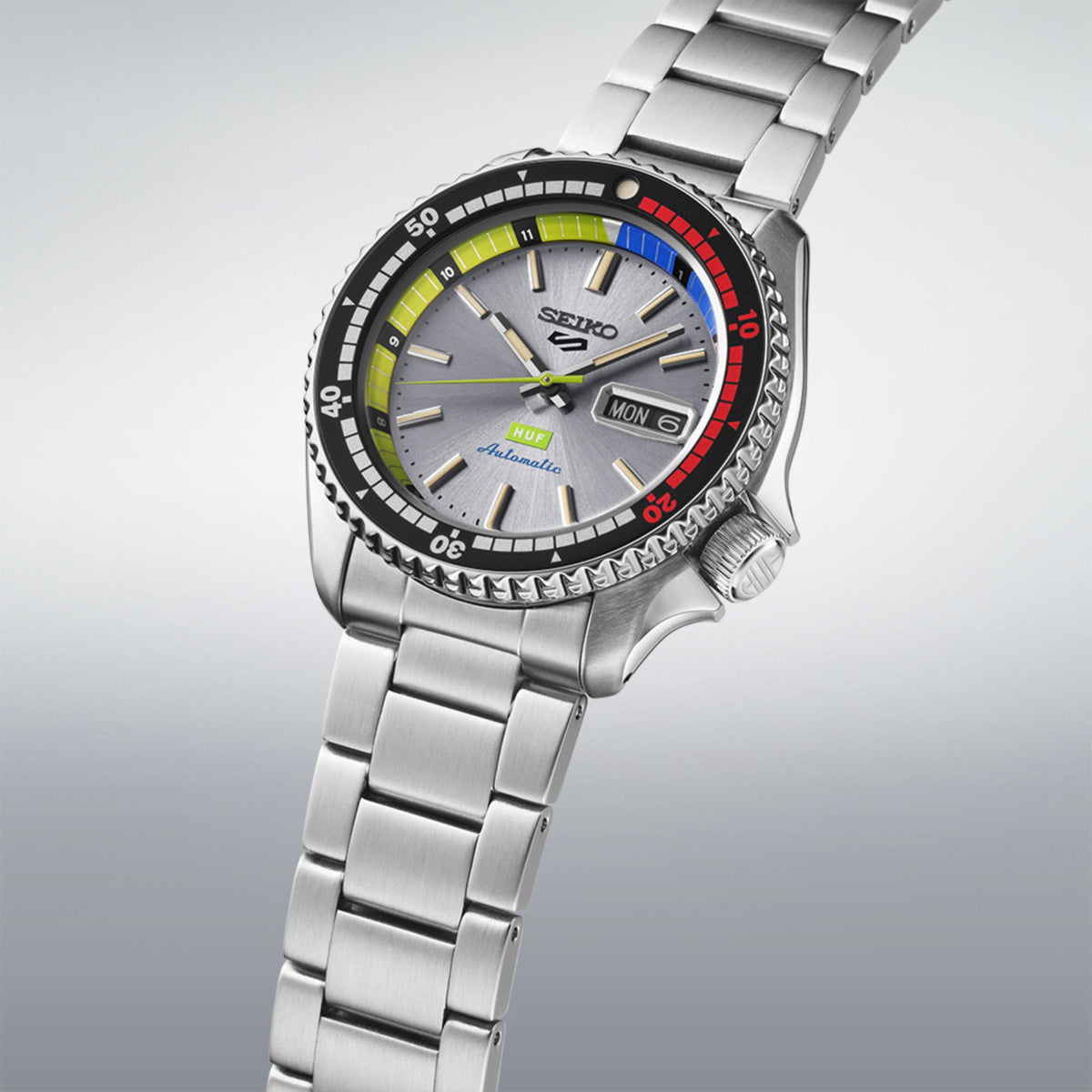 Seiko 5 Sports x HUF SRPL33K1 silver dial three-quarter angle view