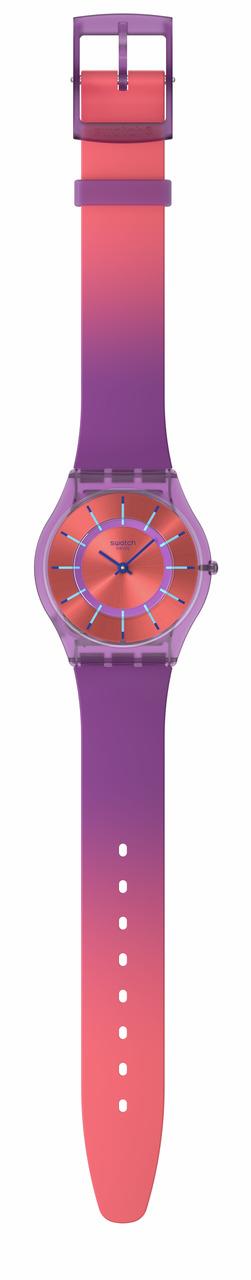 Purple silicone strap watch with orange-red dial, side view